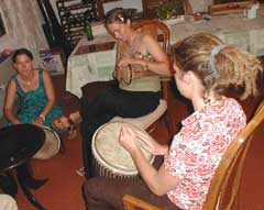 Volunteers make music at one of our weekly Saturday dinners at our house